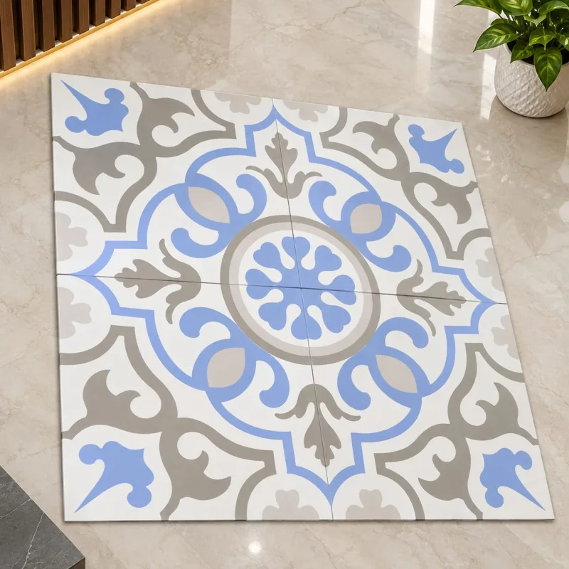Four custom printed tiles forming one blue and grey medallion pattern on a marble floor